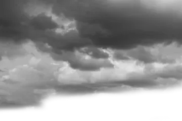 a black and white photo of clouds in the sky
