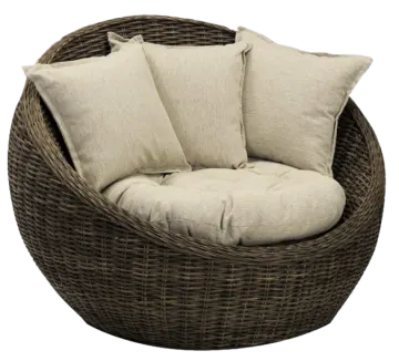 a wicker chair with two pillows on it