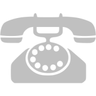 a black and white photo of an old telephone