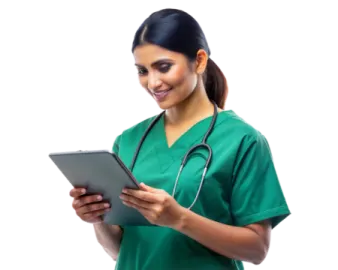 a woman in green scrubs holding a tablet