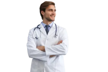 a male doctor standing with his arms crossed