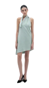 a model in a light green dress