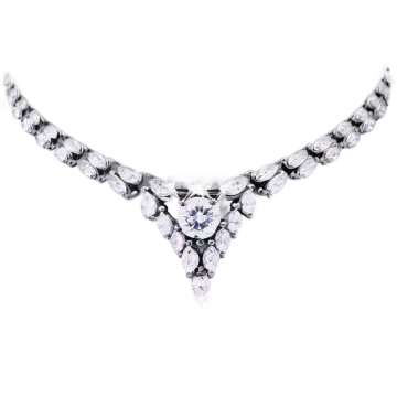 a diamond necklace on a white background