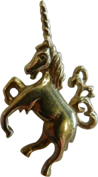 a gold pendant with a horse on it