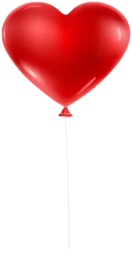 a red heart balloon floating in the air
