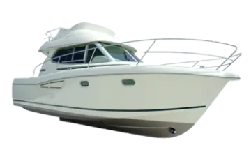 a white boat sitting on top of a trailer