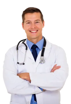 a male doctor standing with his arms crossed