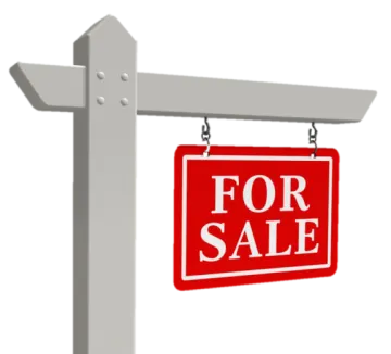 a red for sale sign hanging on a white pole