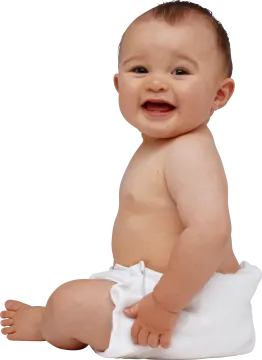 a baby is sitting on the floor and smiling