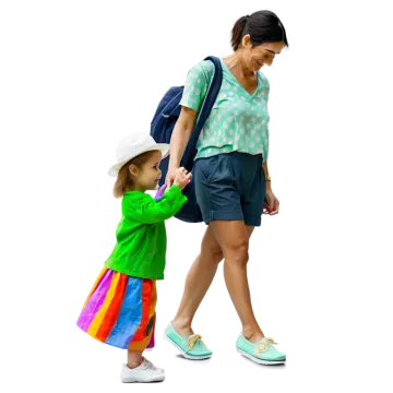 a woman walking with a small child