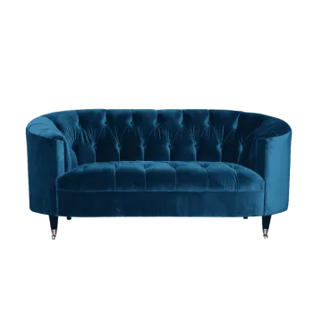 an image of a blue velvet sofa
