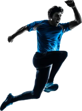 a silhouette of a man jumping in the air