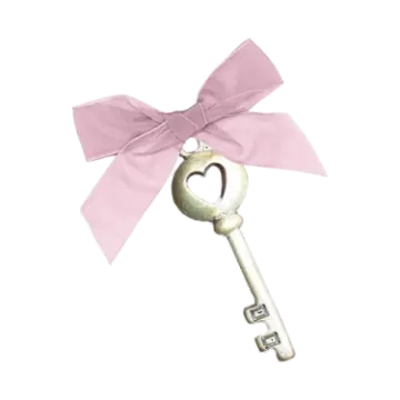 a key with a pink ribbon tied around it