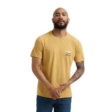 a man wearing a yellow t - shirt and blue jeans