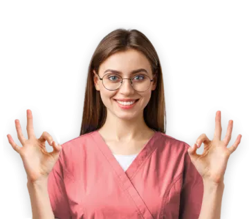 a woman in a pink scrub suit with her hands up