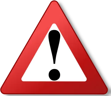 a red and white triangular sign with a question mark on it