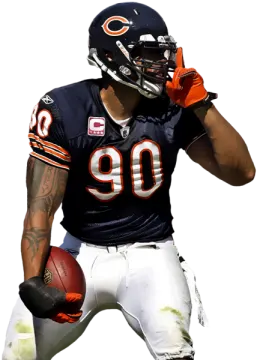 a man in a uniform holding a football ball