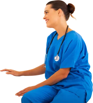 a woman in scrubs sitting on the floor