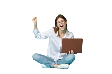 a woman sitting on the floor with her laptop