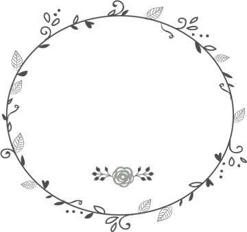 a circular frame with leaves and flowers