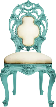 a chair with an ornate design on the back