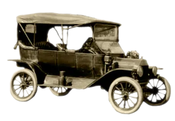 a black and white photo of an old car