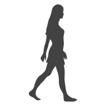 a silhouette of a woman walking
