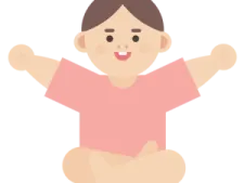 a little girl sitting on the floor with her arms outstretched