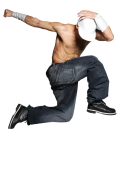 a man jumping in the air while wearing a hat