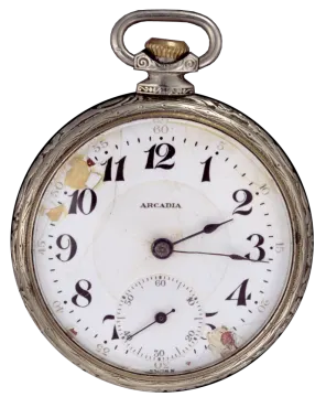 an old silver pocket watch on a white background