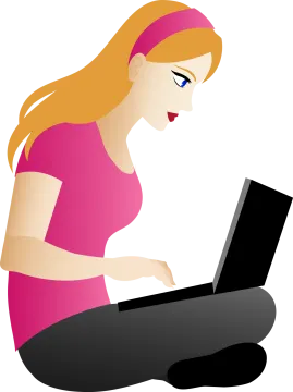 a woman sitting on the floor using her laptop