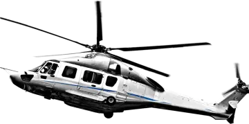 a black and white helicopter flying through the air