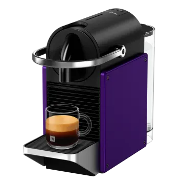 a coffee machine with a cup of coffee