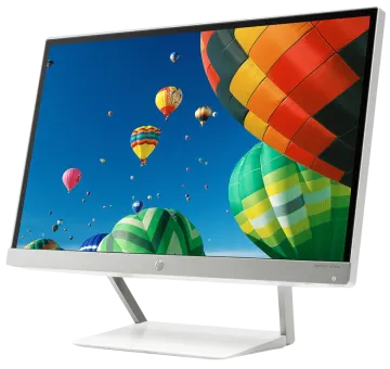a computer monitor with balloons flying in the sky