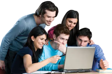 a group of people looking at a laptop