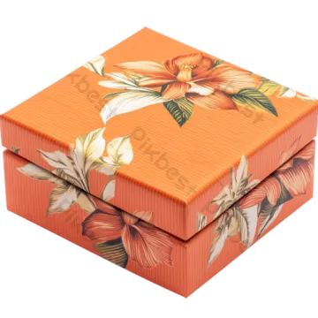 an orange gift box with a floral design