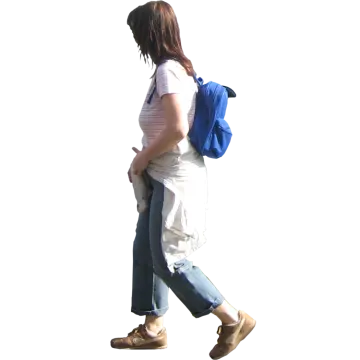 a woman walking with a backpack on her back