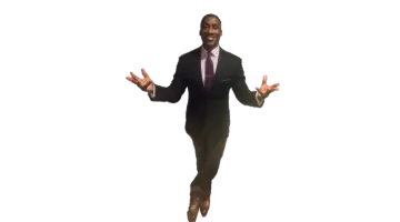 a man in a suit and tie is jumping