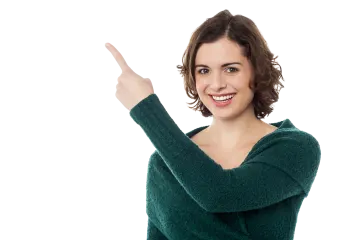 a woman in a green sweater points at the camera