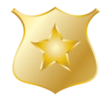 a gold police badge with a star