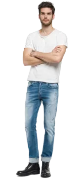 a man standing with his arms crossed