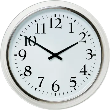 a white clock with black numbers on it