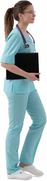 a woman wearing scrubs and holding a laptop