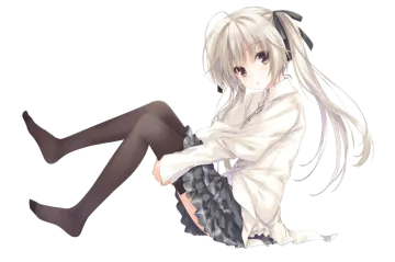 a girl sitting on the floor with her legs crossed