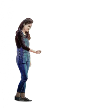 a woman in blue jeans and black jacket