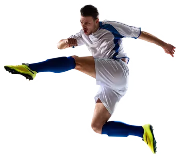 a man jumping in the air with a soccer ball