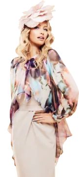 a woman in a dress and hat
