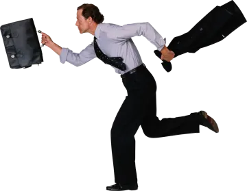 a man in a white shirt is running with a briefcase