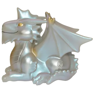a silver dragon sitting on top of a white background