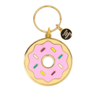 a pink and yellow dont shaped keychai